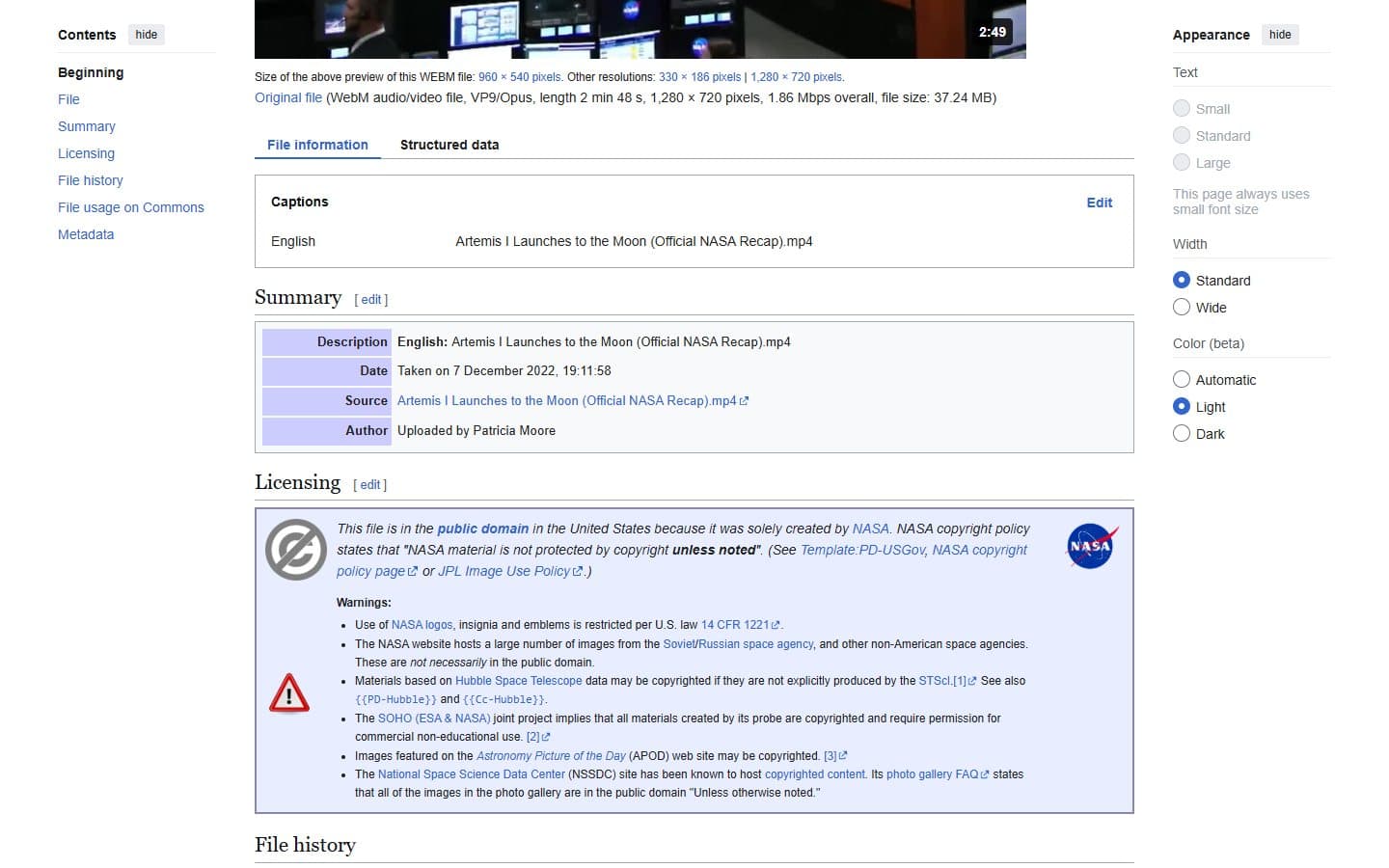 A Wikimedia Commons file page for a NASA Artemis I video, with a Licensing box saying the file is in the public domain and a list of warnings